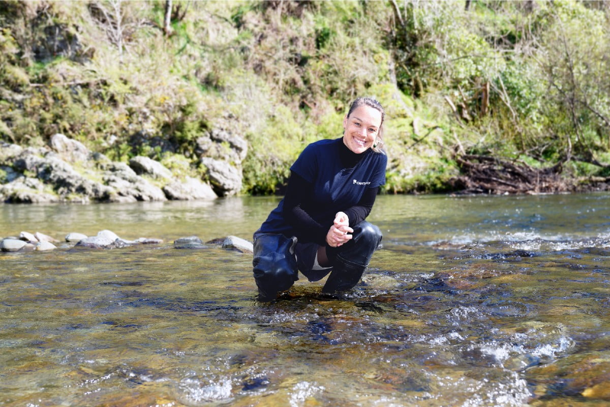 Kati Doehring in a river, image c/o Cawthron Institute