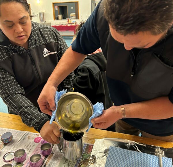 Cautney Davies shows rongoa Maori medicine making for farm animal uses with farmer Mohi Beckham